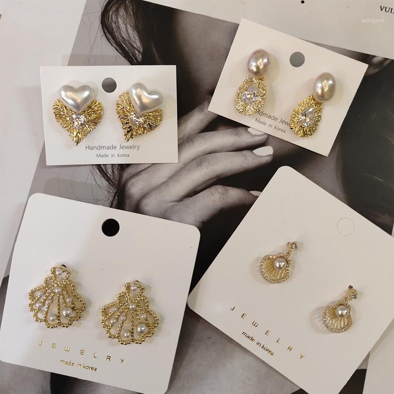 Stud MENGJIQIAO Korean Vintage Shiny Metal Gold Color Shell Heart Earrings For Women Elegant Pearl Boucle D'oreille Jewelry1
Stud MENGJIQIAO Korean Vintage Shiny Metal Gold Color Shell Heart Earrings For Women Elegant Pearl Boucle D'oreille Jewelry1