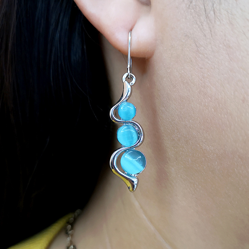 Multi-style fashion Bohemian Creative Curve Wave-Shaped Earrings European and American Inlaid Hailan Cat Eye Gem Swing Earrings
Multi-style fashion Bohemian Creative Curve Wave-Shaped Earrings European and American Inlaid Hailan Cat Eye Gem Swing Earrings