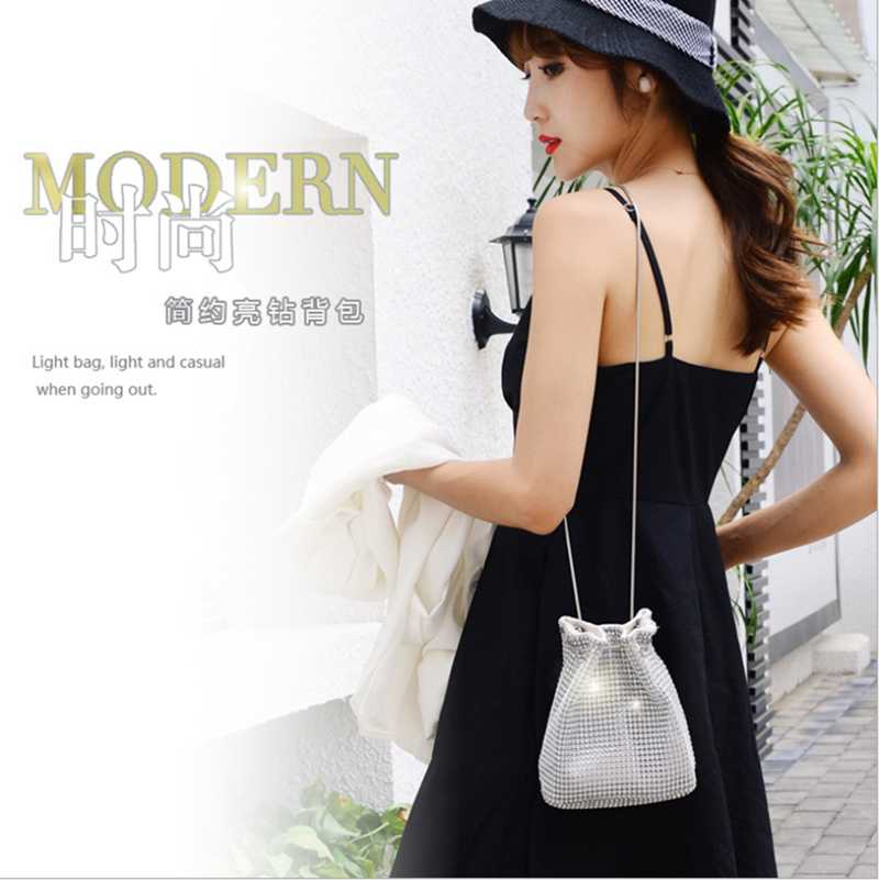 2021 summer new small fresh PU female solid color bucket bag bright diamond shoulder messenger bag rhinestone chain, Black
2021 summer new small fresh PU female solid color bucket bag bright diamond shoulder messenger bag rhinestone chain, Black