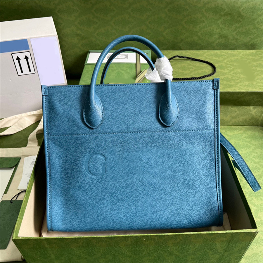 Authentic Travel Bags G Small Tote Blue Orange Black Leather Mans Shoulder Bag 674822 31.5*26.5*15CM 674850 36.5*38.5*15CM With Original Box
Authentic Travel Bags G Small Tote Blue Orange Black Leather Mans Shoulder Bag 674822 31.5*26.5*15CM 674850 36.5*38.5*15CM With Original Box