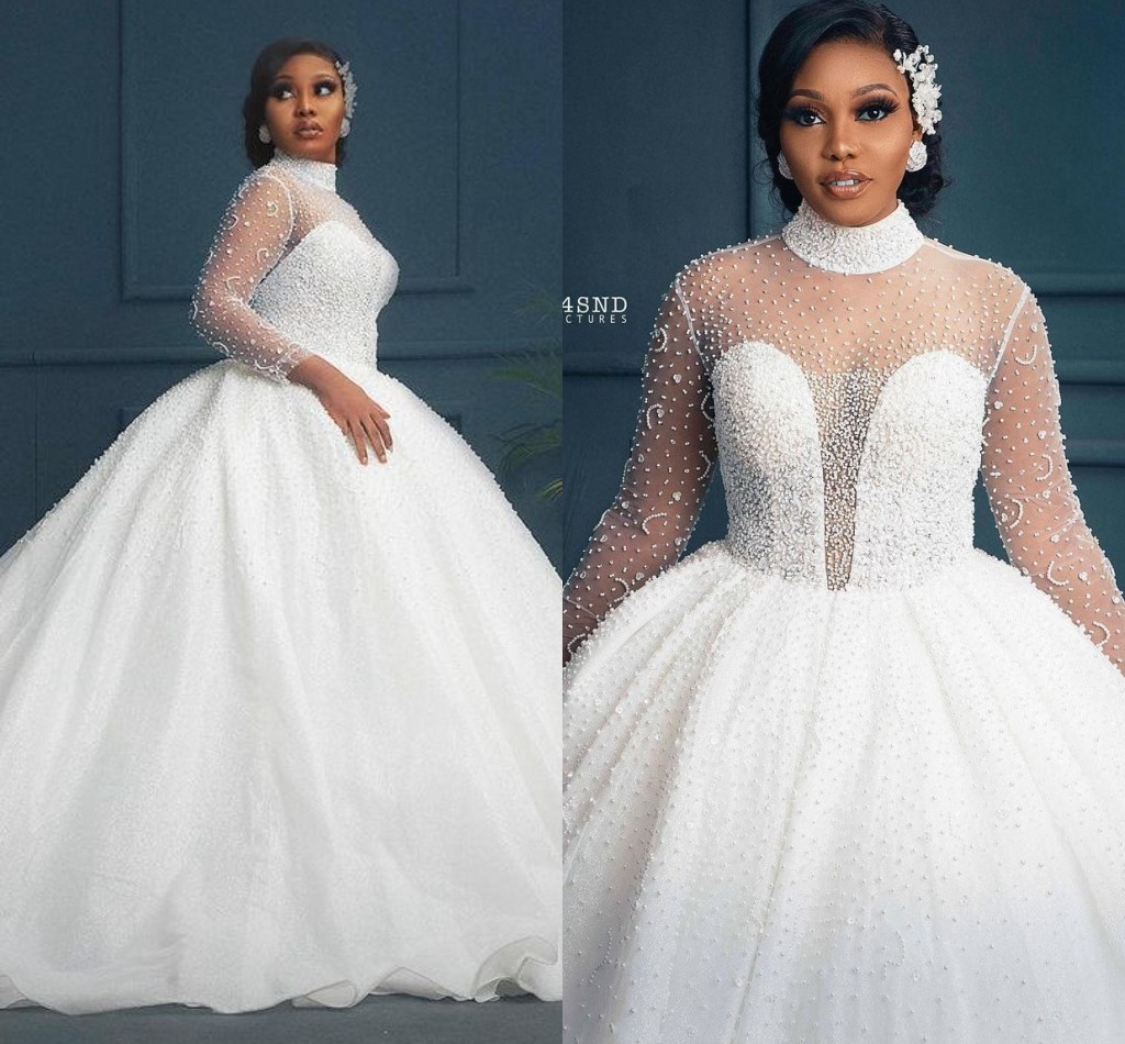 African Bride Gowns 2022 Arabic Dubai Luxury Sequin Bridal Wedding Dresses Pearls Illusion High Neck New Robe De Mariee, Ivory
African Bride Gowns 2022 Arabic Dubai Luxury Sequin Bridal Wedding Dresses Pearls Illusion High Neck New Robe De Mariee, Ivory