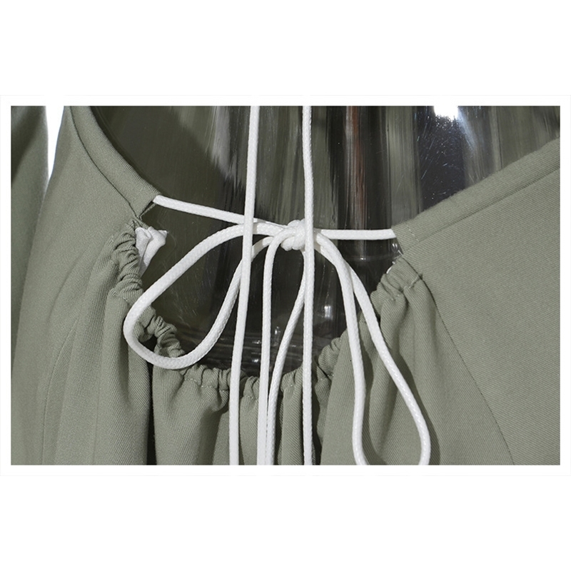 [EAM] Women Asymmetrical Hollow Out Long Trench New Lapel Long Sleeve Loose Fit Windbreaker Fashion Spring Autumn LJ201128