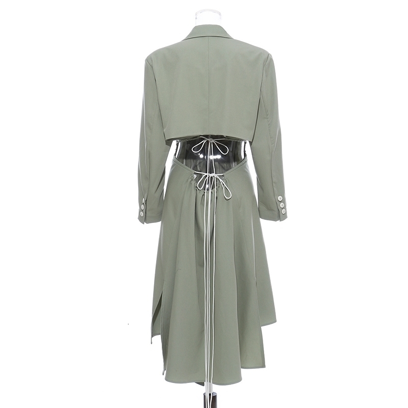 [EAM] Women Asymmetrical Hollow Out Long Trench New Lapel Long Sleeve Loose Fit Windbreaker Fashion Spring Autumn LJ201128