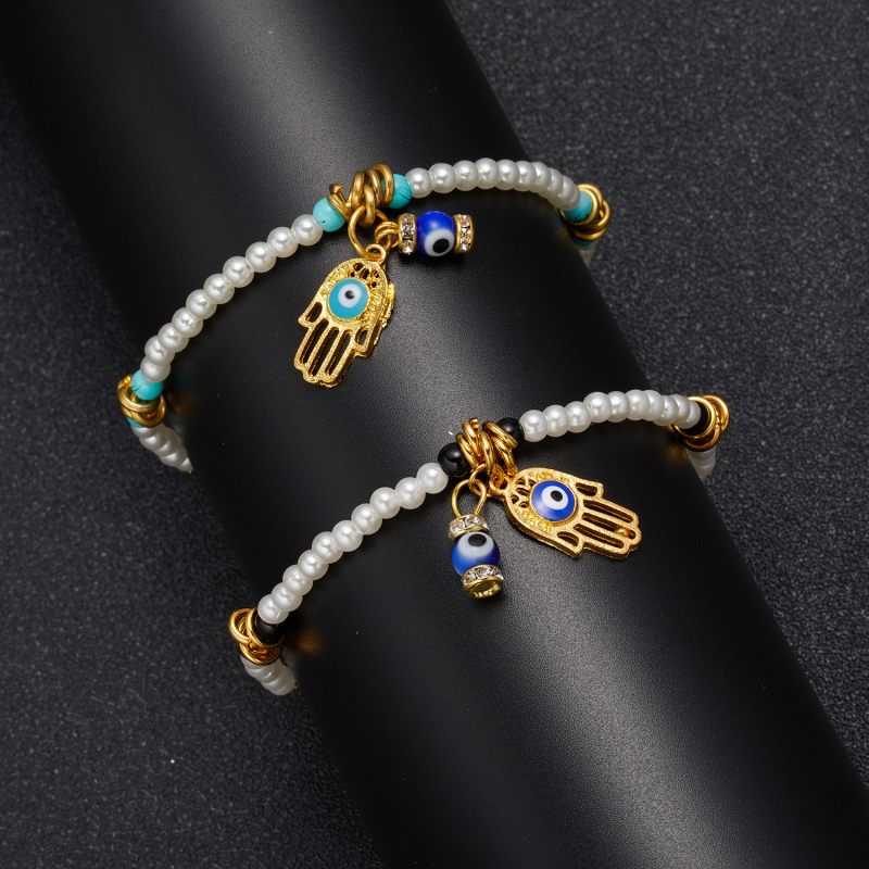 Colorful Handmade Bohemian Seedbeads Evil Eye Fatima Hand Charm Bracelet for Wholesale
Colorful Handmade Bohemian Seedbeads Evil Eye Fatima Hand Charm Bracelet for Wholesale