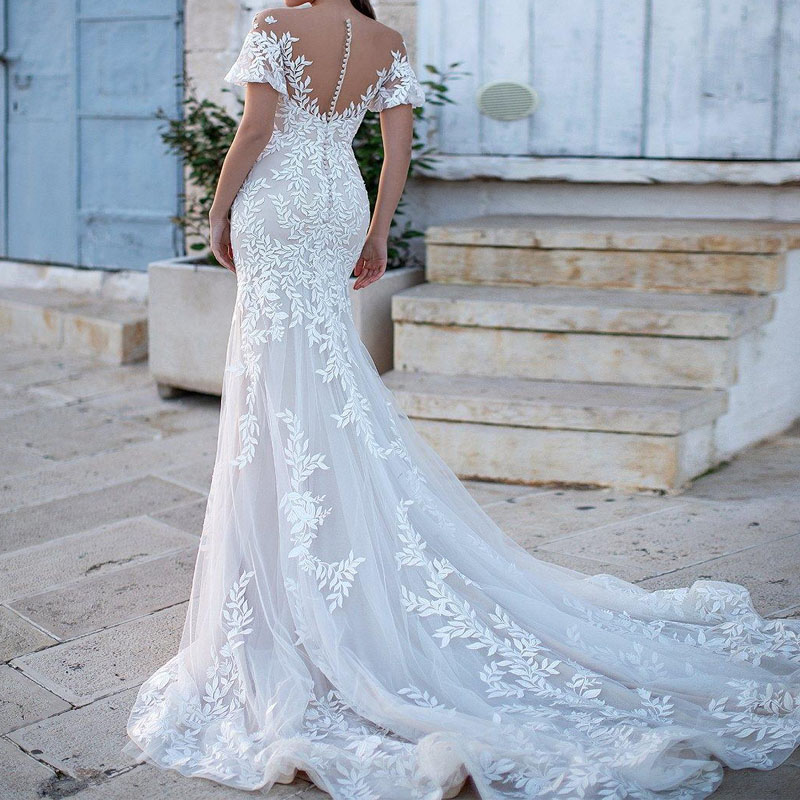 Beaded Lace Mermaid Wedding Dresses Sheer Bateau Neck Short Sleeves Bridal Gowns Covered Buttons Back Sweep Train robe de mariée