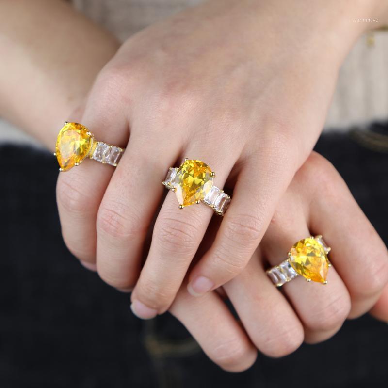 fashion iced out bling water drop pink pinky baguette pink gold cz finger rings for girl women charm wedding jewelry gift1
fashion iced out bling water drop pink pinky baguette pink gold cz finger rings for girl women charm wedding jewelry gift1