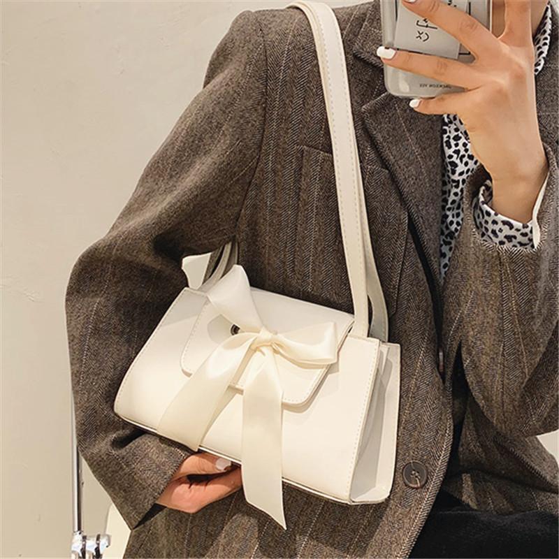 New Elegant Bowknot Decoration PU Leather Shoulder Bag for Women Wild Style Solid Color Flap Daily Shopping Ladies Handbags Sac, Black
New Elegant Bowknot Decoration PU Leather Shoulder Bag for Women Wild Style Solid Color Flap Daily Shopping Ladies Handbags Sac, Black