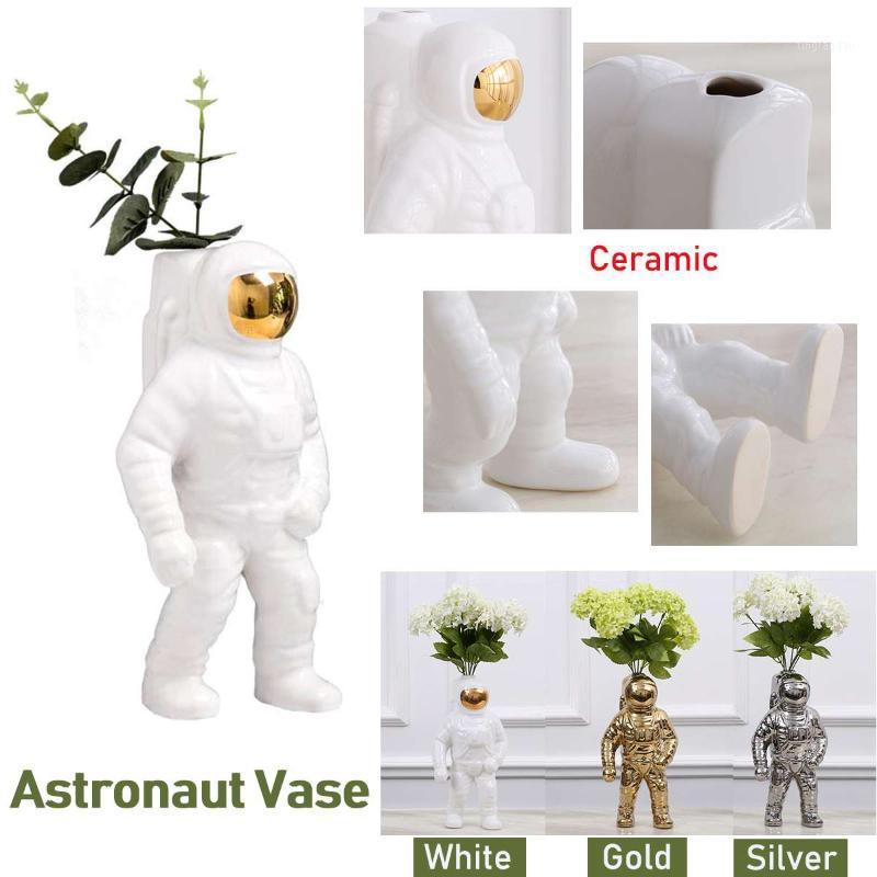 Space Man Sculpture Astronaut Fashion Vase Rocket Aircraft Ornament Model Ceramic Material Cosmonaut Statue Shuttle Desk Decor1
Space Man Sculpture Astronaut Fashion Vase Rocket Aircraft Ornament Model Ceramic Material Cosmonaut Statue Shuttle Desk Decor1