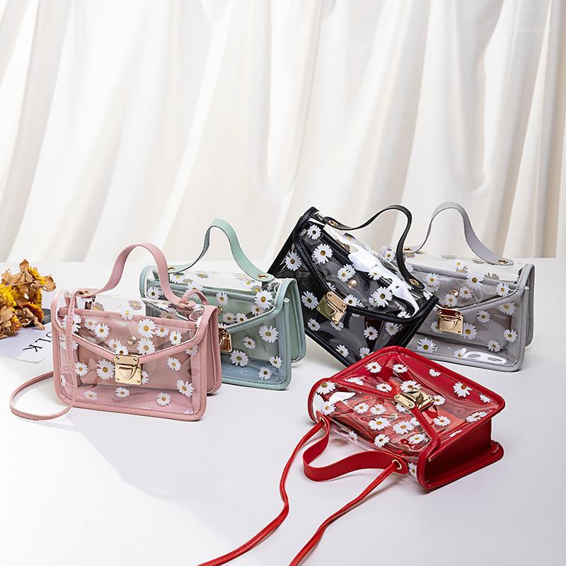 Women Transparent Daisy Pattern Shoulder Bag Hardware Chain Strap Color Square Block Messenger Handbag Composite Tote1
Women Transparent Daisy Pattern Shoulder Bag Hardware Chain Strap Color Square Block Messenger Handbag Composite Tote1