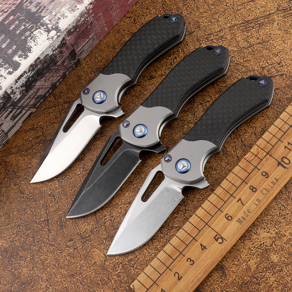 Pocket M390 powder steel blade Titanium + carbon fiber handle outdoor tactical hunting defensive mini folding knife EDC Tool
Pocket M390 powder steel blade Titanium + carbon fiber handle outdoor tactical hunting defensive mini folding knife EDC Tool
