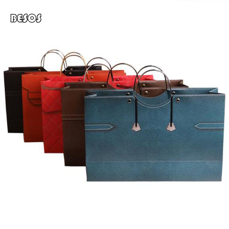 Fashionable Bronzing Solid Color Suitcase Design Christmas New Year Wine Double Horizontal Version Ring Handle Gift Bag B155D
Fashionable Bronzing Solid Color Suitcase Design Christmas New Year Wine Double Horizontal Version Ring Handle Gift Bag B155D