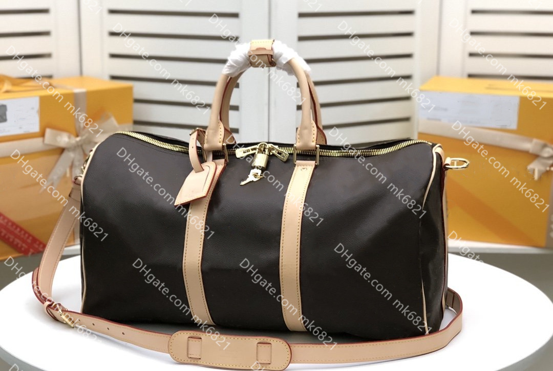 Genuine Leather Brand KP Tote Men Women Handbag Luxury Designers Top-quality Duffle Bags Luggage Travel Bag Large Capacity 45 50 55cm
Genuine Leather Brand KP Tote Men Women Handbag Luxury Designers Top-quality Duffle Bags Luggage Travel Bag Large Capacity 45 50 55cm