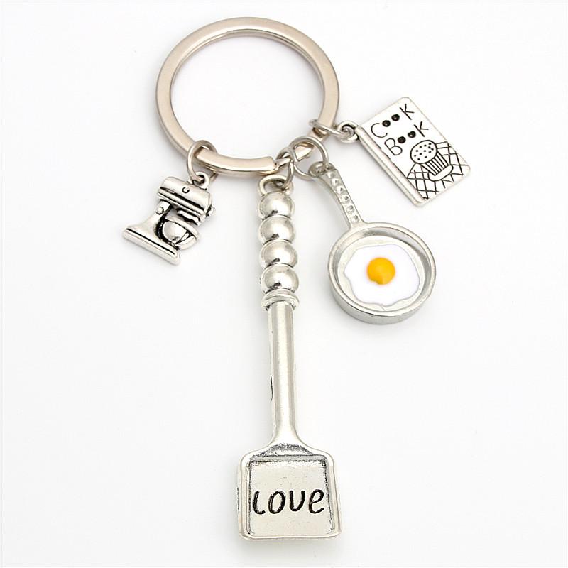 Keychains Fashion Cute Cook Oil Pan Fired Egg Chef Key Ring Cutlery Kitchen Tableware Keychain Jewelry Gift For Children
Keychains Fashion Cute Cook Oil Pan Fired Egg Chef Key Ring Cutlery Kitchen Tableware Keychain Jewelry Gift For Children