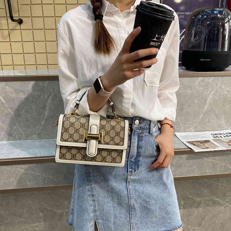 Bag women summer new simple small square bag wide shoulder belt crowd portable messenger sling Shoulder, White
Bag women summer new simple small square bag wide shoulder belt crowd portable messenger sling Shoulder, White
