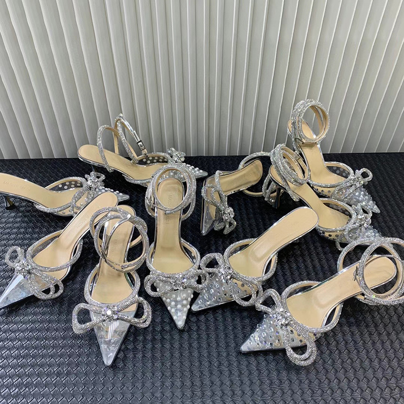 high heeled Sandals MACH Crystal Embellished Bow rhinestone women Dress shoes Designer transparent PVC slippers top quality stiletto heel womens Sandal 35-42, 9.5cm clear drill sandals
high heeled Sandals MACH Crystal Embellished Bow rhinestone women Dress shoes Designer transparent PVC slippers top quality stiletto heel womens Sandal 35-42, 9.5cm clear drill sandals