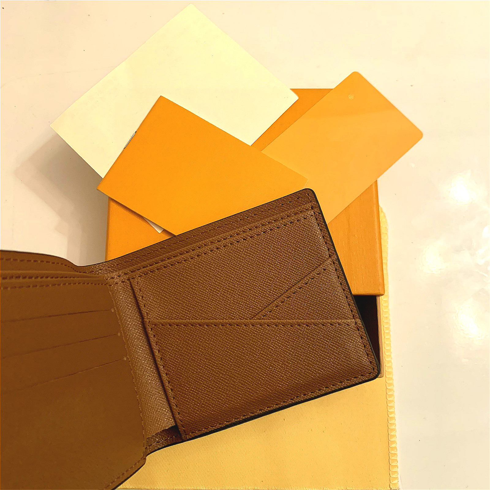 M60895 Luxury Designer Men's Short Compact Multiple Wallet Mono Gram Canvers Receipt Brand Name Bifold wallet Free Shipping Good Quality, Black grid
M60895 Luxury Designer Men's Short Compact Multiple Wallet Mono Gram Canvers Receipt Brand Name Bifold wallet Free Shipping Good Quality, Black grid