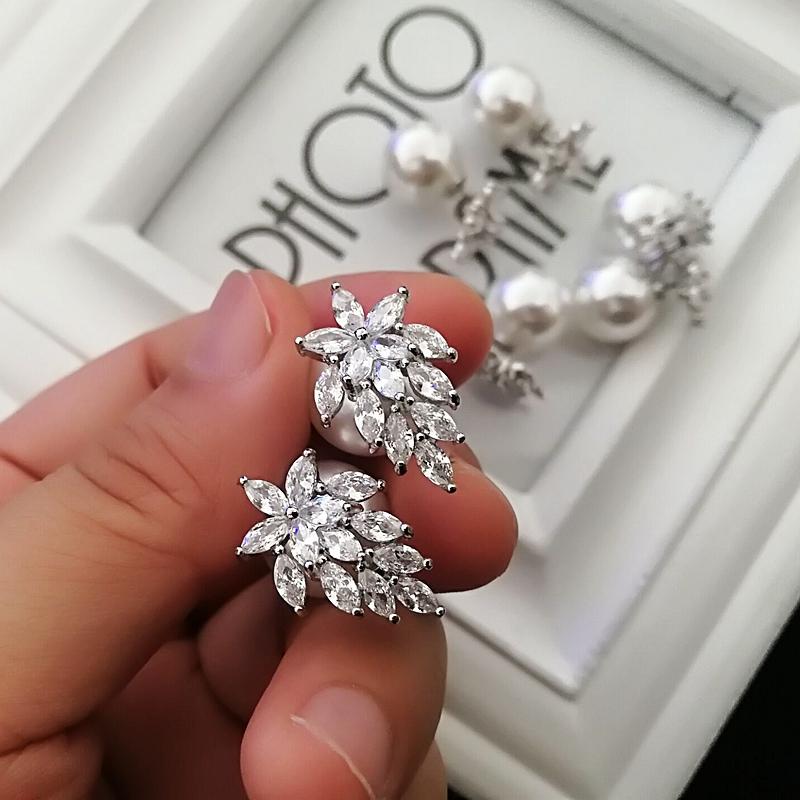 Mimiyagu Korean simple cubic zircon double side pearl earring for women hiqh quality stud earring jewelry
Mimiyagu Korean simple cubic zircon double side pearl earring for women hiqh quality stud earring jewelry