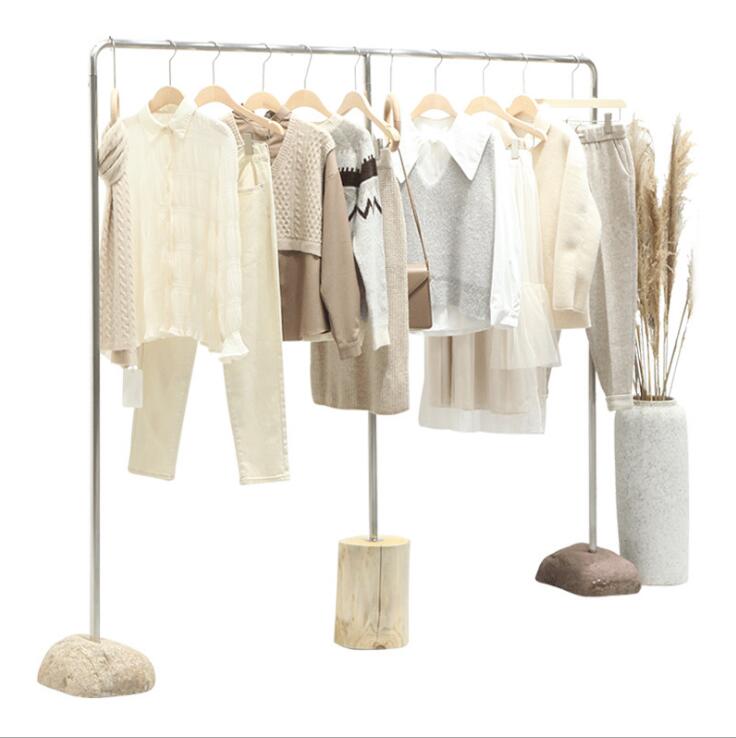 Customized stainless steel silver rack Commercial Furniture drawing stone floor hanging racks women's cloth shop display shelf