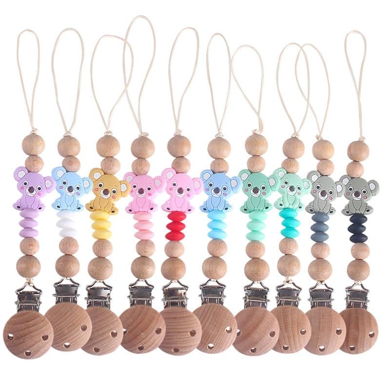 Baby Pacifier Clip Chain Wood Beads Cute Koala Animal Charms Pacifier Chain Chew Baby Teether Toys Dummy Nipple Holder
Baby Pacifier Clip Chain Wood Beads Cute Koala Animal Charms Pacifier Chain Chew Baby Teether Toys Dummy Nipple Holder