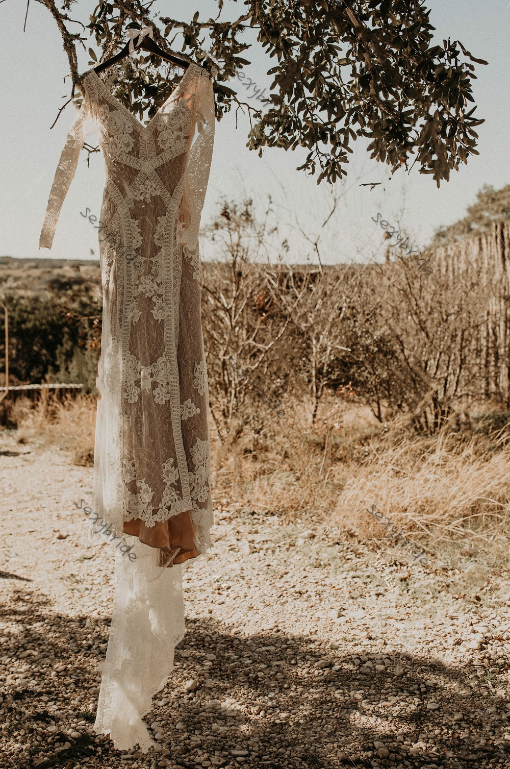 Vintage Beige Mermaid Country Wedding Dresses Illusion Long Sleeve Appliques Sexy Open Back Deep V Neck Thigh Slit Boho Beach Bridal Gowns