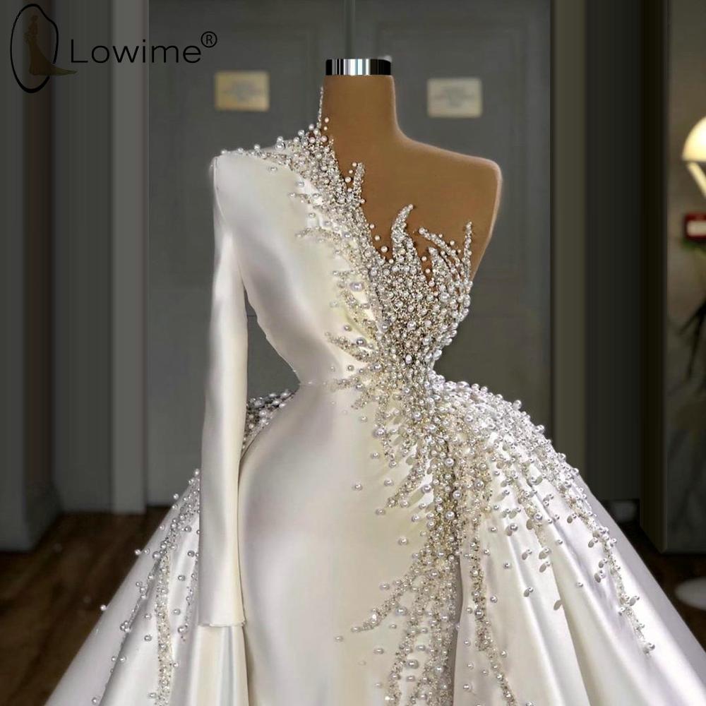 One Shoulder Long Sleeve Mermaid Satin Wedding Dresses with Detachable Train Luxury Heavy Pearls Bridal Gowns, Black
One Shoulder Long Sleeve Mermaid Satin Wedding Dresses with Detachable Train Luxury Heavy Pearls Bridal Gowns, Black