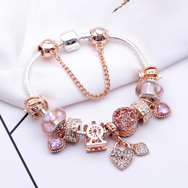Classic rose gold long peach blossom glass bead bracelet DIY heart lock pendant bracelet live source factory
Classic rose gold long peach blossom glass bead bracelet DIY heart lock pendant bracelet live source factory