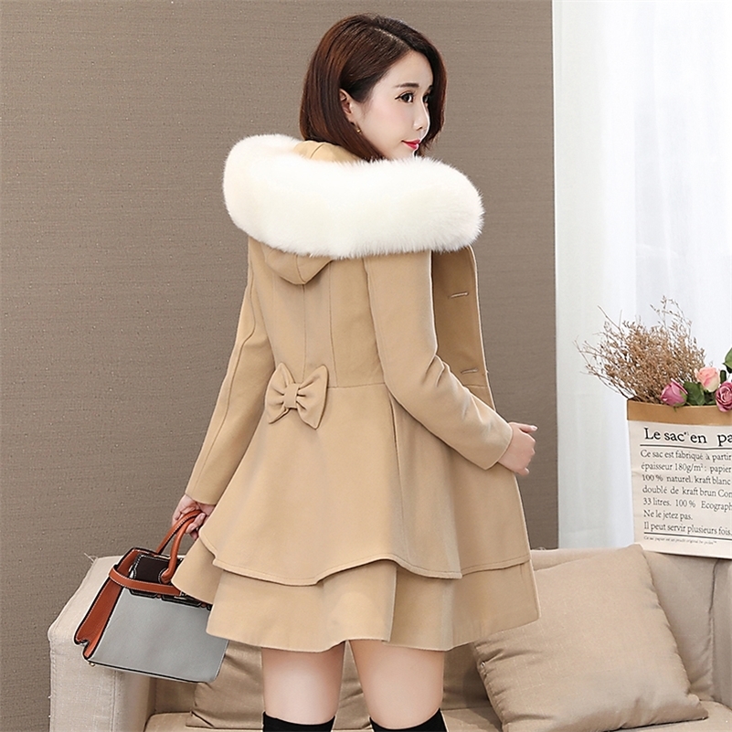 Autumn and winter new women's Korean version of the long section slim slimming pendulum style solid hooded woolen coat Y201001