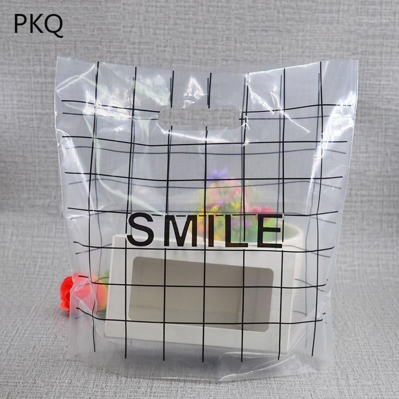 Wholesale 50pcs/lot large grid Plastic Bags 26x28cm small Shopping bag Jewelry Packaging Bags clear Plastic Gift Bag With Handle1
Wholesale 50pcs/lot large grid Plastic Bags 26x28cm small Shopping bag Jewelry Packaging Bags clear Plastic Gift Bag With Handle1