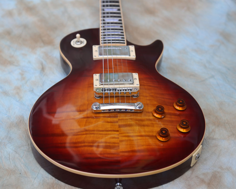 quality electric guitar one piece body, one piece neck, binding over frets Vintage Sunburst guitars
quality electric guitar one piece body, one piece neck, binding over frets Vintage Sunburst guitars