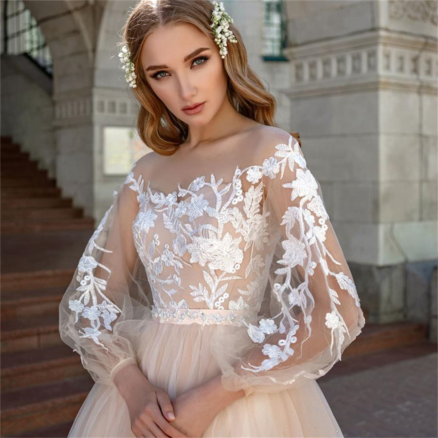 Pretty A Line Champagne Wedding Dresses Appliqued Ivory Lace Illusion Long Sleeves Back Buttons Sweep Train Boho Beach Bridal Gowns Country