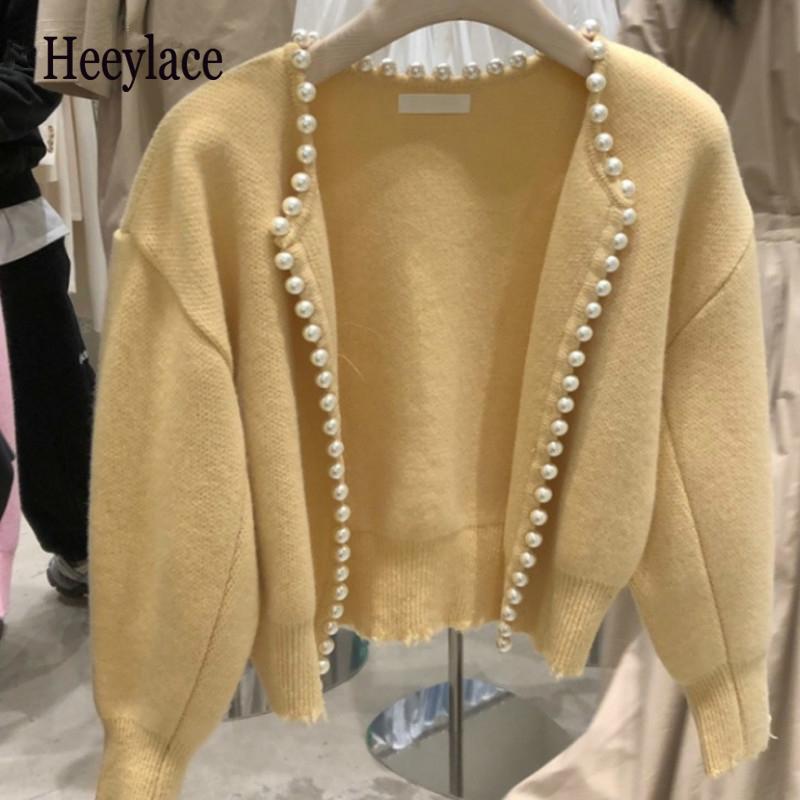 Exquisite Pearl Knit Sweater Women 2020 Autumn Winter New Femme Cardigan O-neck Solid Color Simple All-match Coat, White 
Exquisite Pearl Knit Sweater Women 2020 Autumn Winter New Femme Cardigan O-neck Solid Color Simple All-match Coat, White