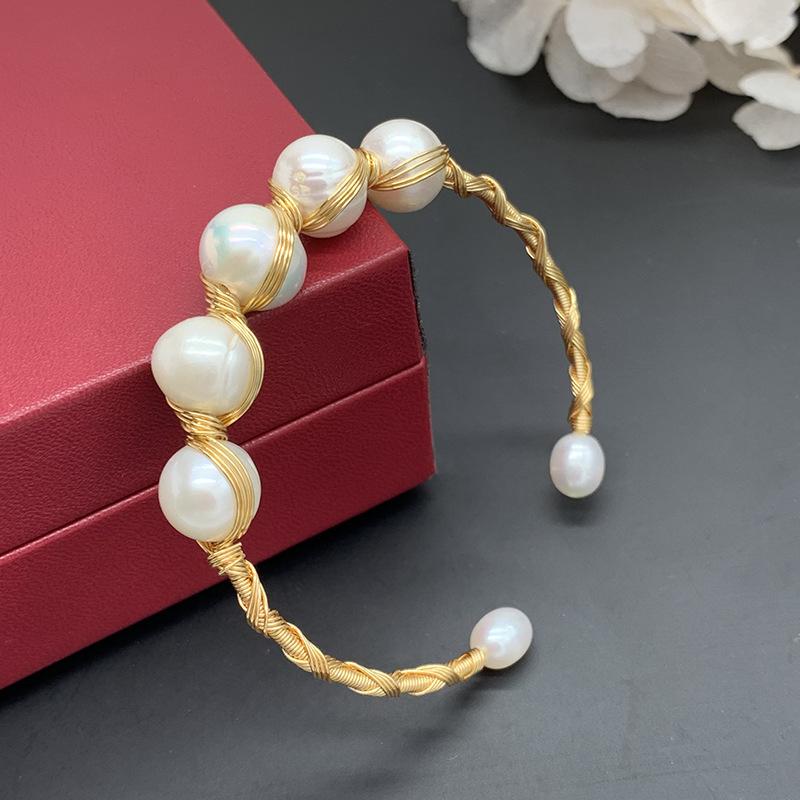 Baroque pure natural pearl arrangement 18K gold thread hand-wound bracelet open bracelet elegant retro classic
Baroque pure natural pearl arrangement 18K gold thread hand-wound bracelet open bracelet elegant retro classic
