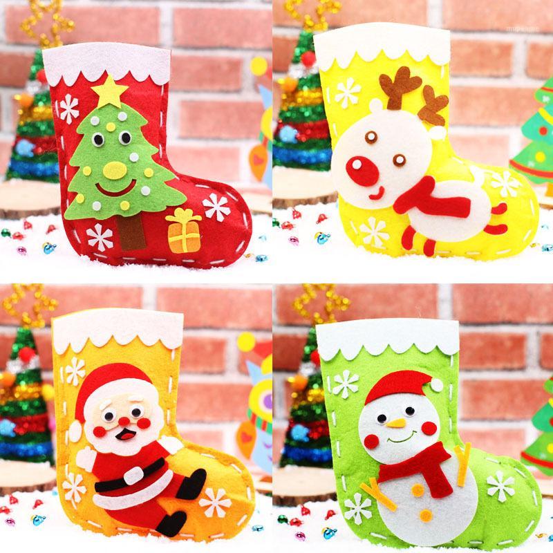 Christmas Stocking DIY Kit Handmade Cartoon Sock Gift holder Bag Kids Toy santa claus Non-woven Gift Candy Bag Xmas ornament1
Christmas Stocking DIY Kit Handmade Cartoon Sock Gift holder Bag Kids Toy santa claus Non-woven Gift Candy Bag Xmas ornament1