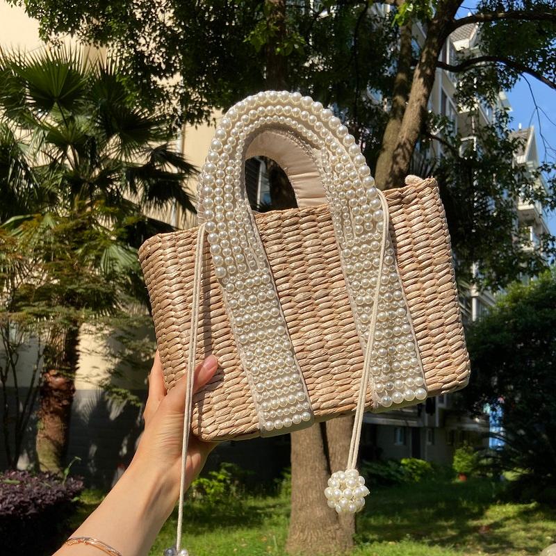 Fashion Pearls Rattan Women Handbags Design Beading Wicker Woven Shoulder Bags Luxury Summer Beach Straw Bag large tote baskets
Fashion Pearls Rattan Women Handbags Design Beading Wicker Woven Shoulder Bags Luxury Summer Beach Straw Bag large tote baskets