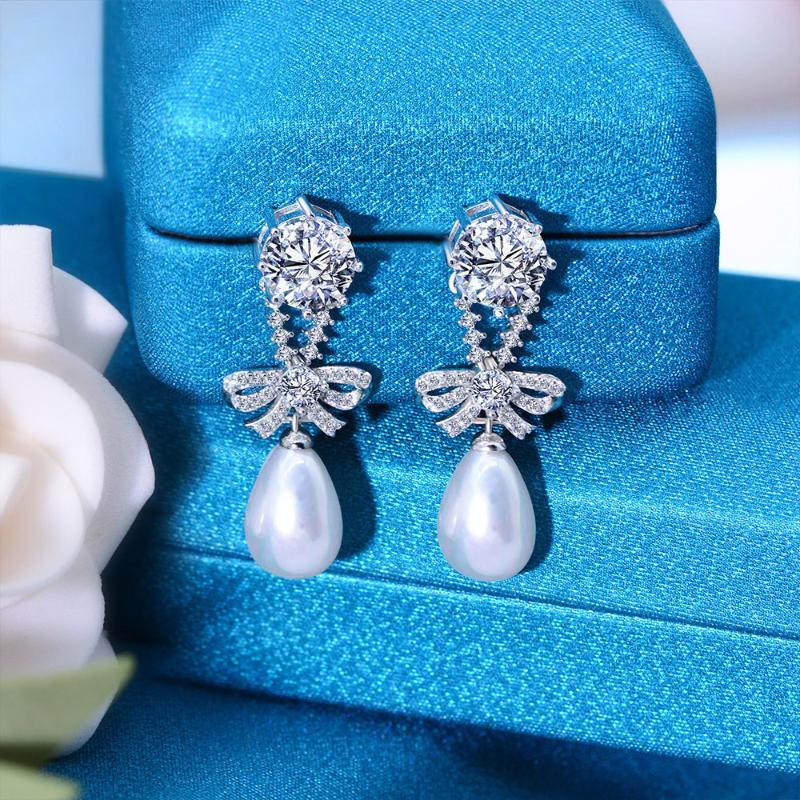 Stud 100%925 Sterling Silver Bow Series Luxury Inlaid High Carbon Diamond Round Drop-Shaped Pearl Earrings
Stud 100%925 Sterling Silver Bow Series Luxury Inlaid High Carbon Diamond Round Drop-Shaped Pearl Earrings