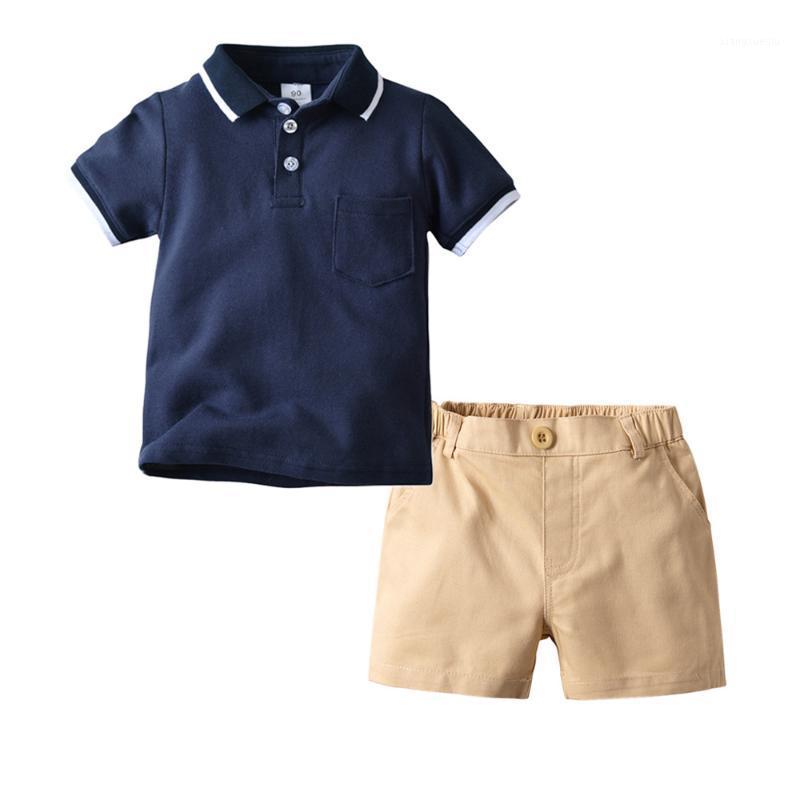 Cross-Border Hot Selling Boys' Dark Blue T-shirt Shirt Kaki Shorts Two-Piece Boys' Summer Half Cardigan Short Sleeve1, White2pc
Cross-Border Hot Selling Boys' Dark Blue T-shirt Shirt Kaki Shorts Two-Piece Boys' Summer Half Cardigan Short Sleeve1, White2pc