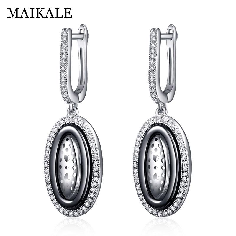 MAIKALE Trendy Round Black White Ceramic Drop Earrings for Women Silver Color Hollow Heart Cubic Zirconia Hanging Earrings Gifts
MAIKALE Trendy Round Black White Ceramic Drop Earrings for Women Silver Color Hollow Heart Cubic Zirconia Hanging Earrings Gifts
