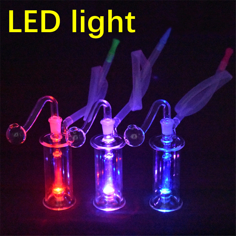 New LED Glass Bong Water Pipes 10mm Female Pyrex Glow in the dark Recycler Oil Rigs Glass Bong with glass oil burner pipe
New LED Glass Bong Water Pipes 10mm Female Pyrex Glow in the dark Recycler Oil Rigs Glass Bong with glass oil burner pipe