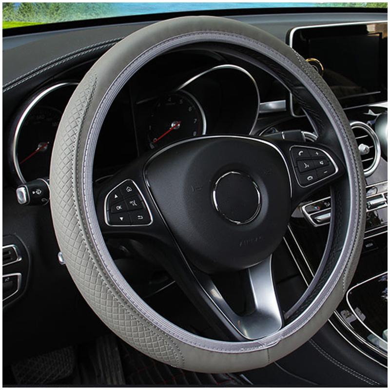 Universal Car Fiber Leather Steering Wheel Cover Auto Breathable Elastic Skid Proof Steering-wheel Covers Car Interior Styling
Universal Car Fiber Leather Steering Wheel Cover Auto Breathable Elastic Skid Proof Steering-wheel Covers Car Interior Styling