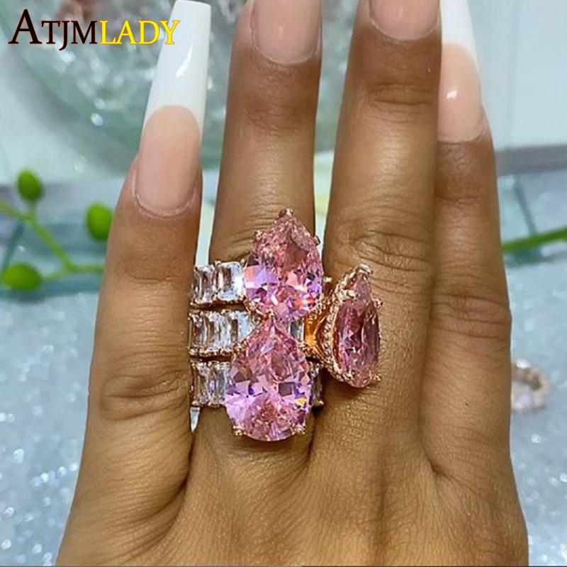 2020 fashion big pink Pinky water drop accent stone Rose gold pricess cut full cz band wedding engagement ring for women
2020 fashion big pink Pinky water drop accent stone Rose gold pricess cut full cz band wedding engagement ring for women