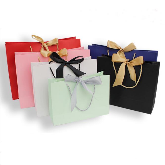 New Arrival Pink Wedding Gift Bags Packaging Box with Ribbon Present Favors Bag Paper Gift Bag For Clothing/T-shirt
New Arrival Pink Wedding Gift Bags Packaging Box with Ribbon Present Favors Bag Paper Gift Bag For Clothing/T-shirt