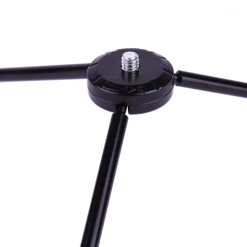 Mini Universal Metal Tripod Stand phone Mount Telescope Adjustable Holder Telescope Stand Mount for Smartphones Cameras1
Mini Universal Metal Tripod Stand phone Mount Telescope Adjustable Holder Telescope Stand Mount for Smartphones Cameras1
