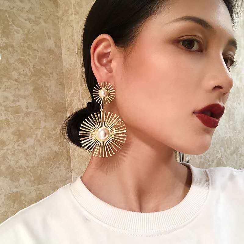 New Korean-Style Ear Rings Net Red Set Pearl Ear Stud Cool Two Sunflower Earrings Female Temperament Bohemia Earrings
New Korean-Style Ear Rings Net Red Set Pearl Ear Stud Cool Two Sunflower Earrings Female Temperament Bohemia Earrings