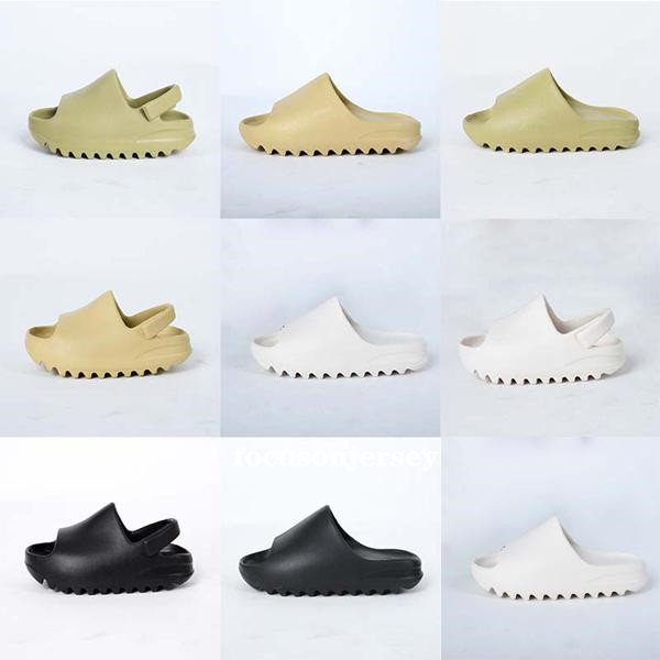 2020 Baby Kids shoes Foam Runner Bone Black Slides Foam Summer kanye Toddlers west Desert Sand Resin Beach Childrens slipper Resin Sandals T
2020 Baby Kids shoes Foam Runner Bone Black Slides Foam Summer kanye Toddlers west Desert Sand Resin Beach Childrens slipper Resin Sandals T