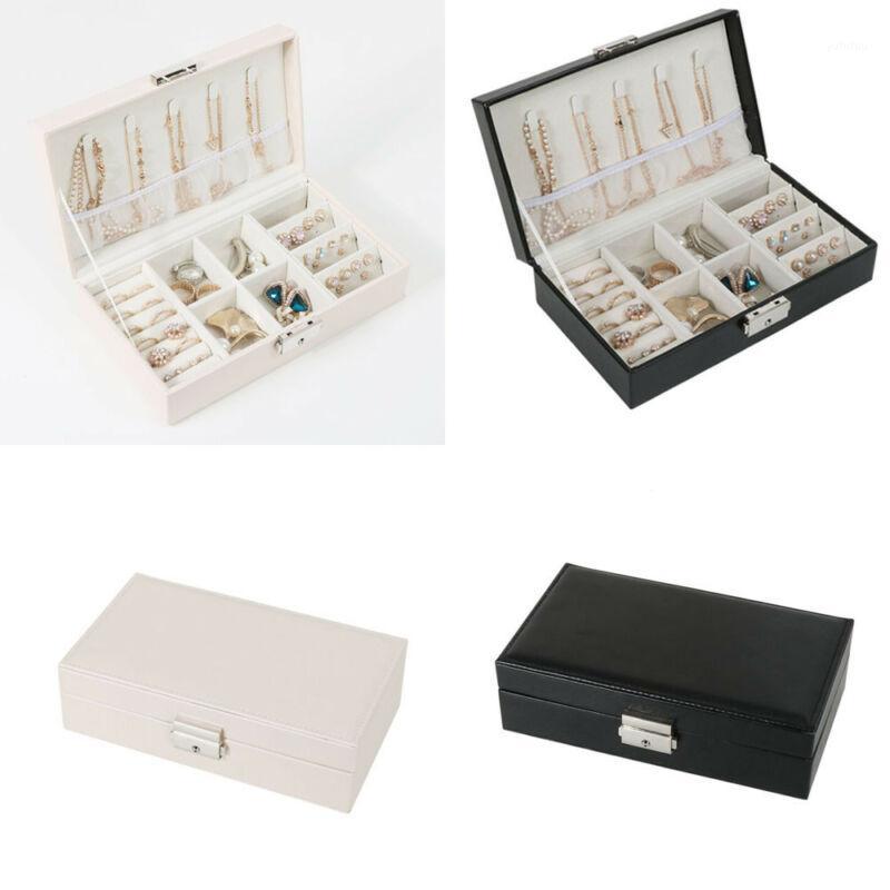 Leather Jewelry Box Organizer Travel Case Earring Ring Necklace Storage Hot Sale Cosmetic Bags1, As photo shows
Leather Jewelry Box Organizer Travel Case Earring Ring Necklace Storage Hot Sale Cosmetic Bags1, As photo shows