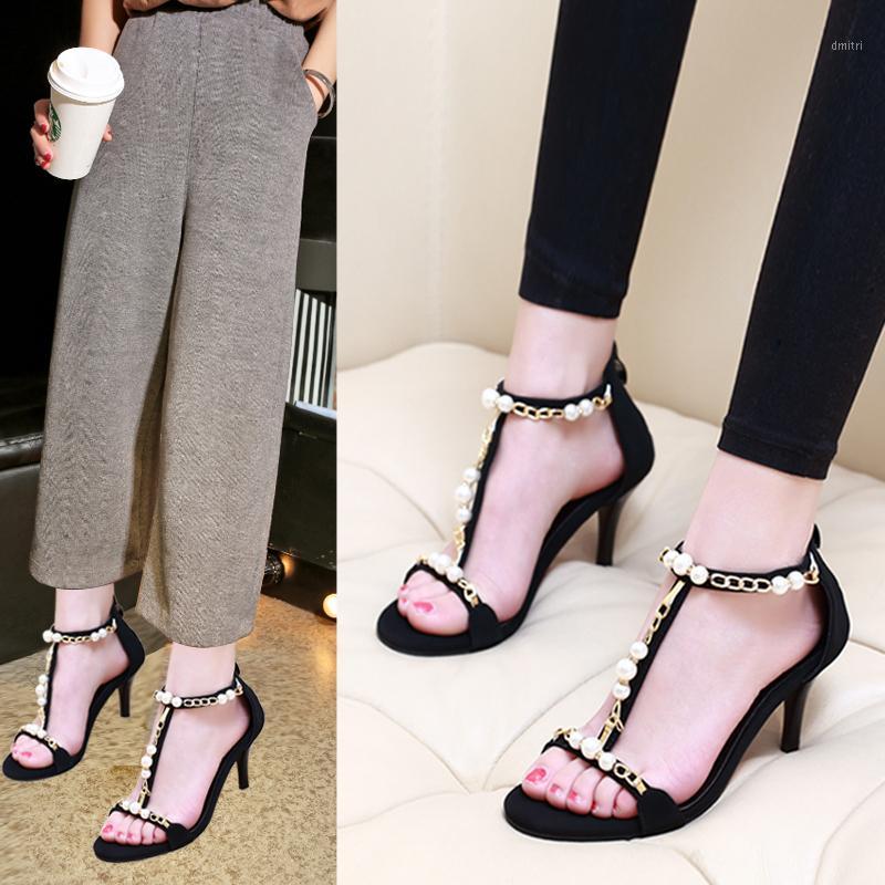 2020 summer new fine heel middle heel black T-strap sandals European and American pearl chain open toe high heels women1
2020 summer new fine heel middle heel black T-strap sandals European and American pearl chain open toe high heels women1