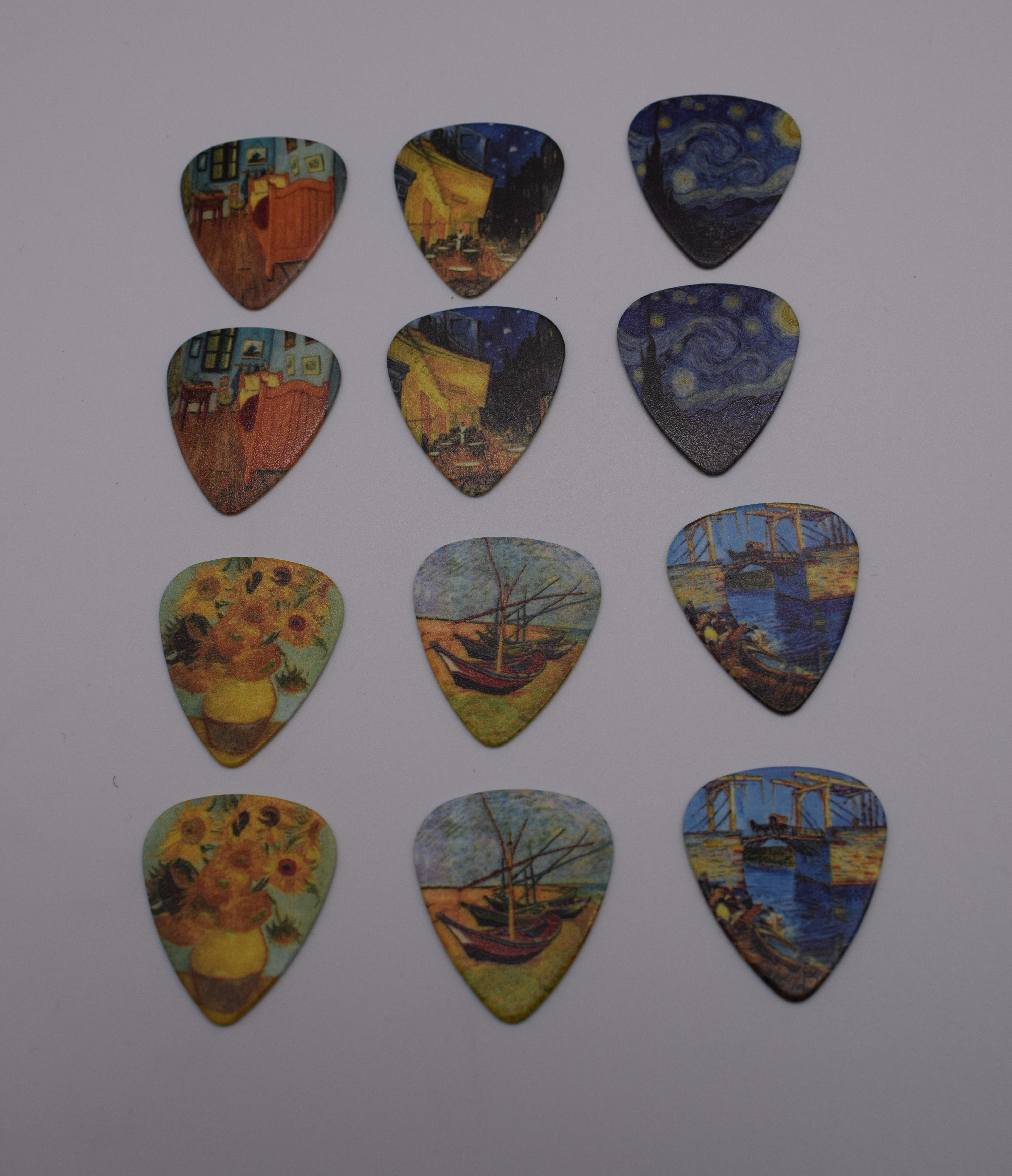 12pcs 0.71mm Two Side World Famous Painting Musical Plectrums Great Tin Box Packed Guitar Picks
12pcs 0.71mm Two Side World Famous Painting Musical Plectrums Great Tin Box Packed Guitar Picks
