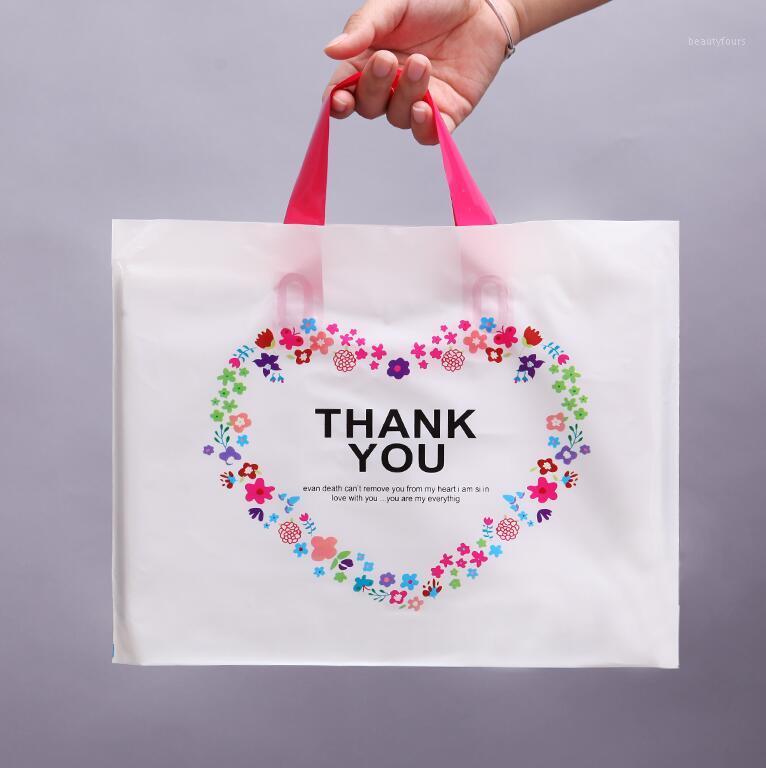 50pcs 28*33cm/37*38cm Plastic bags with handle Thank you Gift Packing Bags Cookie Candy Party1
50pcs 28*33cm/37*38cm Plastic bags with handle Thank you Gift Packing Bags Cookie Candy Party1
