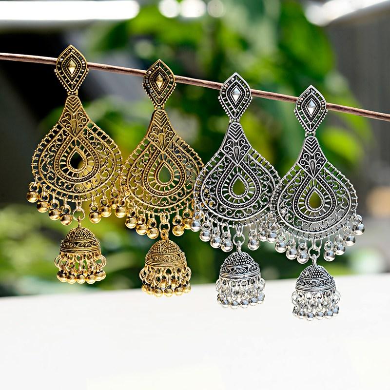 OIQUEI Women Jhumka Earring Bohemia Ethnic Metal Hollow Carved Big Bells Long Tassel Hanging Earrings Femme Gypsy Jewelry
OIQUEI Women Jhumka Earring Bohemia Ethnic Metal Hollow Carved Big Bells Long Tassel Hanging Earrings Femme Gypsy Jewelry