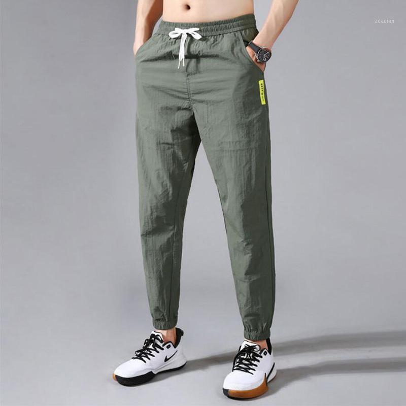 Men's casual Pants Ankle-length Summer thin Quick-drying pants Korean style loose harem trousers Streetwear sweatpants F7030031, Black
Men's casual Pants Ankle-length Summer thin Quick-drying pants Korean style loose harem trousers Streetwear sweatpants F7030031, Black